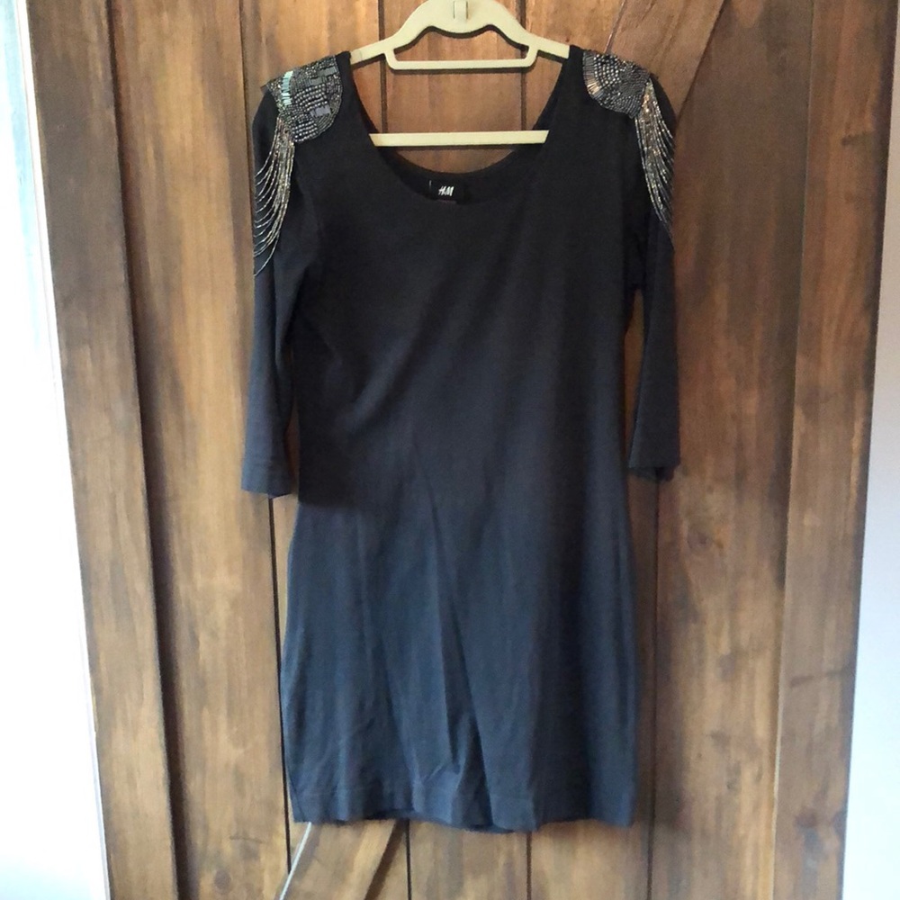 Stunning shoulder board body con dress